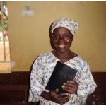Woman smilling with Bible